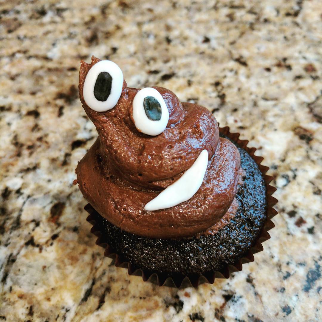 This is what happens to one of @quebuenobakery’s poop emoji cupcakes when it jumps off of the tray in a futile attempt to escape. Cupcakes were harmed in the making of this picture