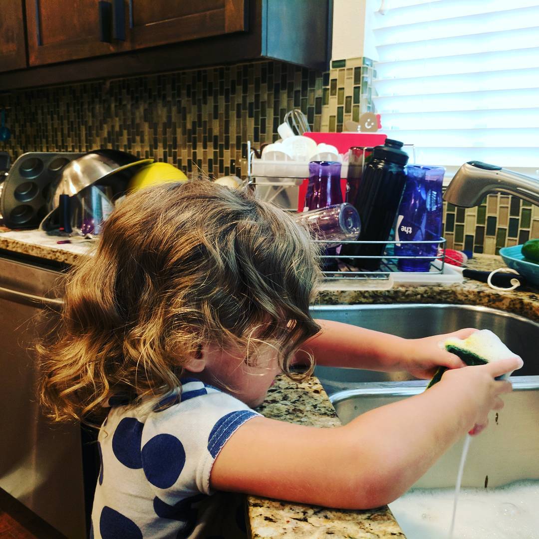 Putting her to work. Look at all those dishes she cleaned!