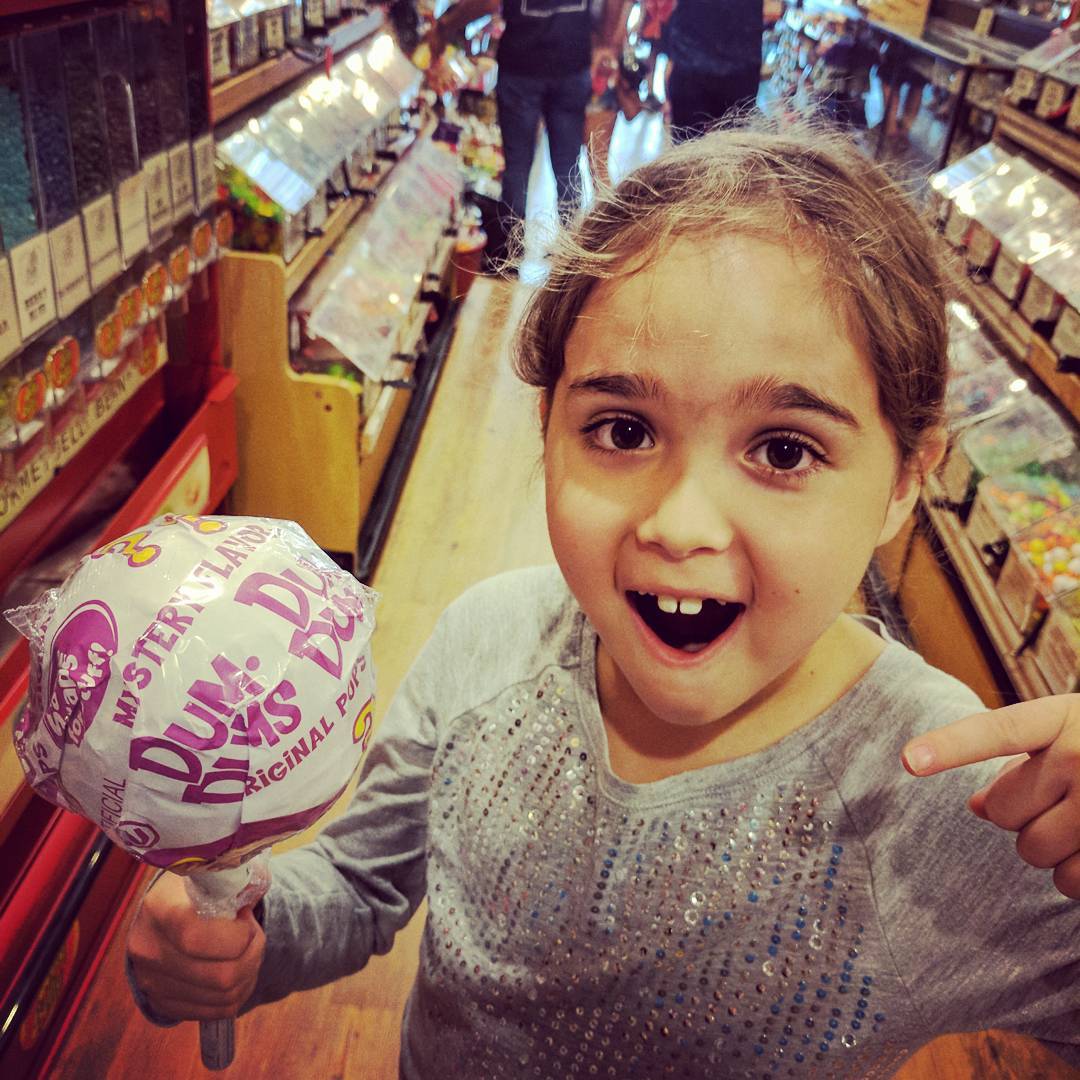 One kiddo solo with Daddy? Let her pick where we go and she went straight to a book of Austin things to do with kids. And straight to the candy shop page. Why not?