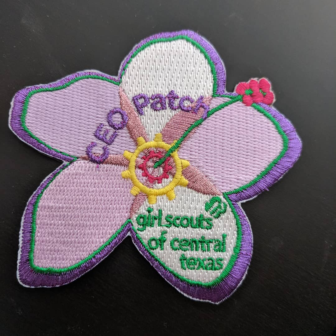 Girl Scouts have patches for everything. When you meet the CEO of the region, she gives girls a patch like commanders do with military challenge coins