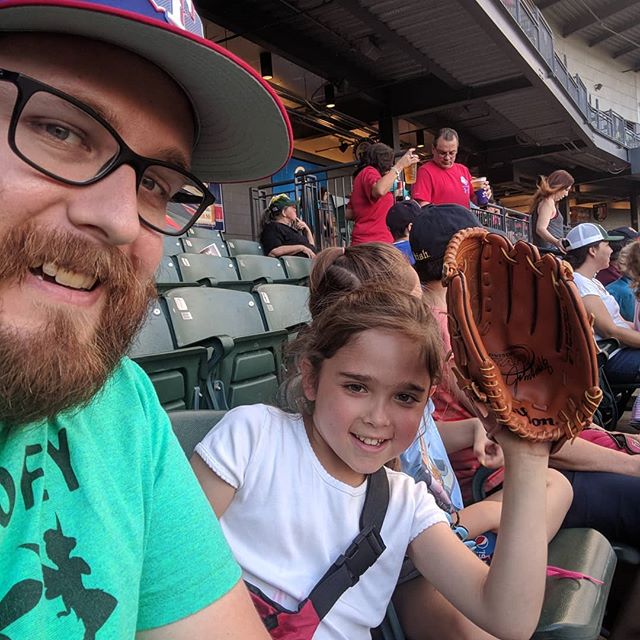 Here’s Olivia doing her best to hide the rest of the family behind her glove