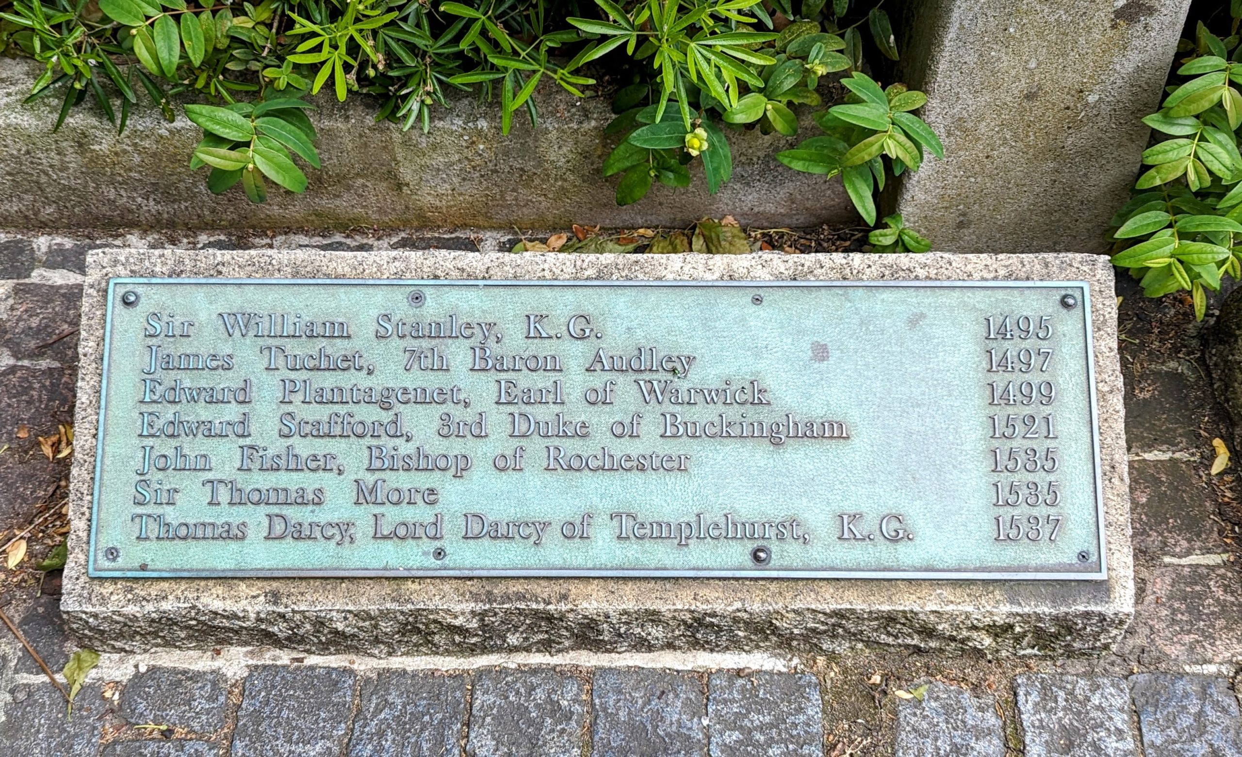 Plaque at the location of the execution of Sts. John Fisher and Thomas More. Includes their names and a number others who were executed for their faith at this spot between 1495 and 1537.