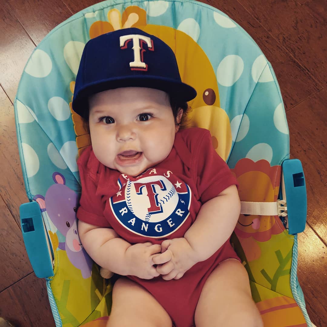 Her @astrosbaseball fan mom and big sister weren’t very impressed. Actions speak louder than words and none of our children at this age would wear a hat except Ruth and her @rangers cap