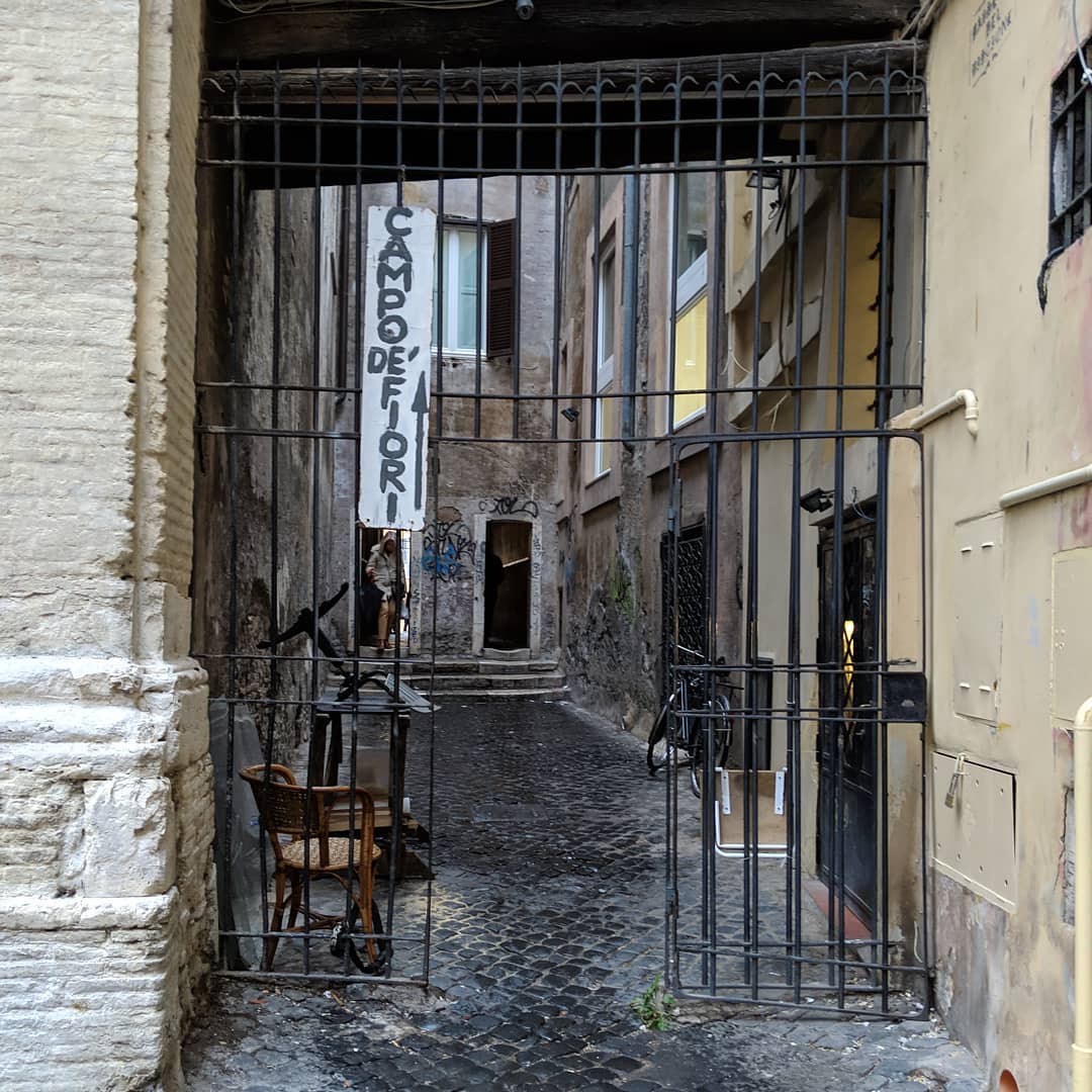 One of my favorite things to do in a new city is explore it on foot acting like I know what I’m doing. I check out a map, get some rough directional ideas in my head, then just walk.

I *was* trying to get to Campo de’ Fiori, so this not-sketchy-at-all navigational aid and dark alley was perfectly placed